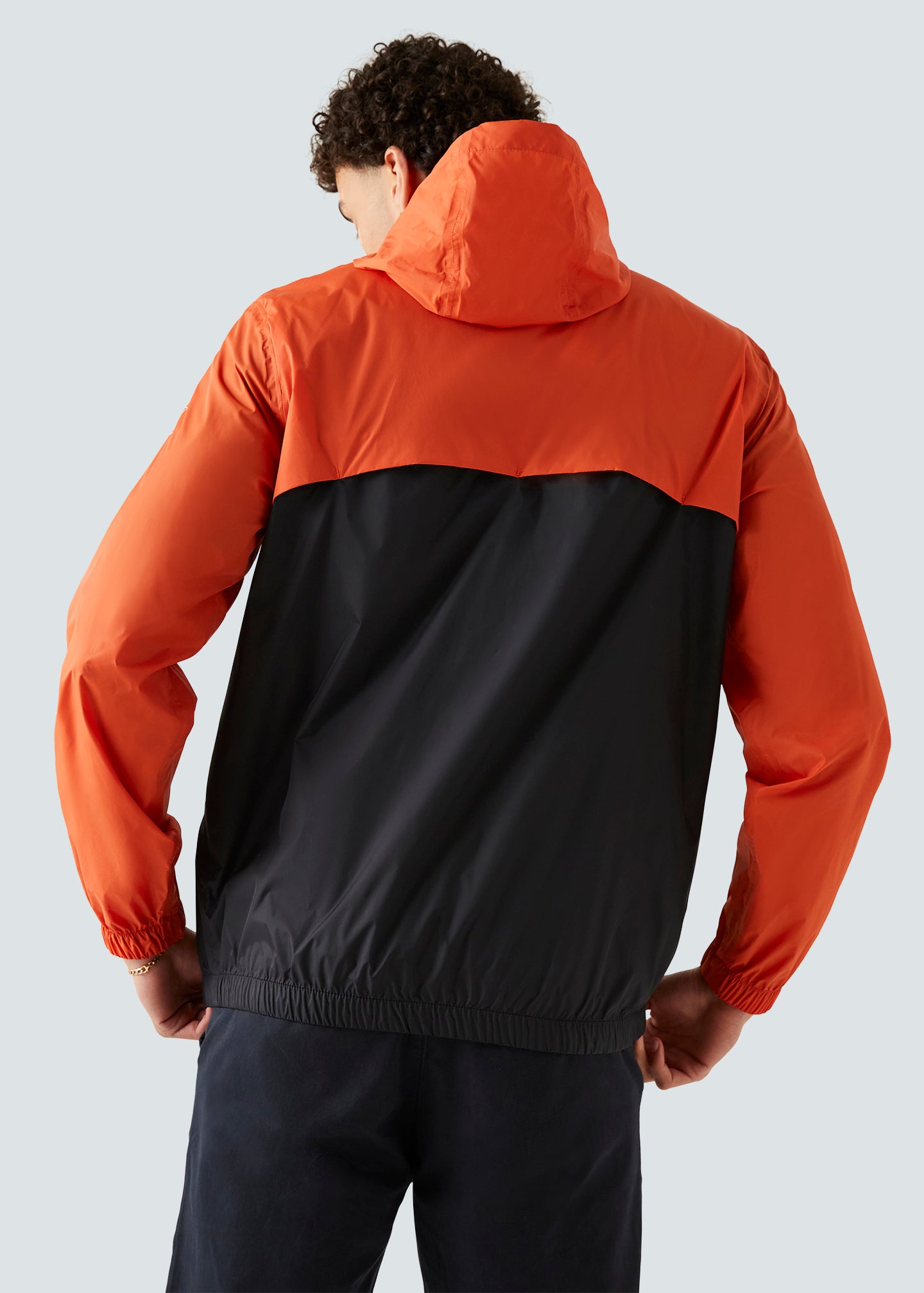 Black and orange windbreaker shop